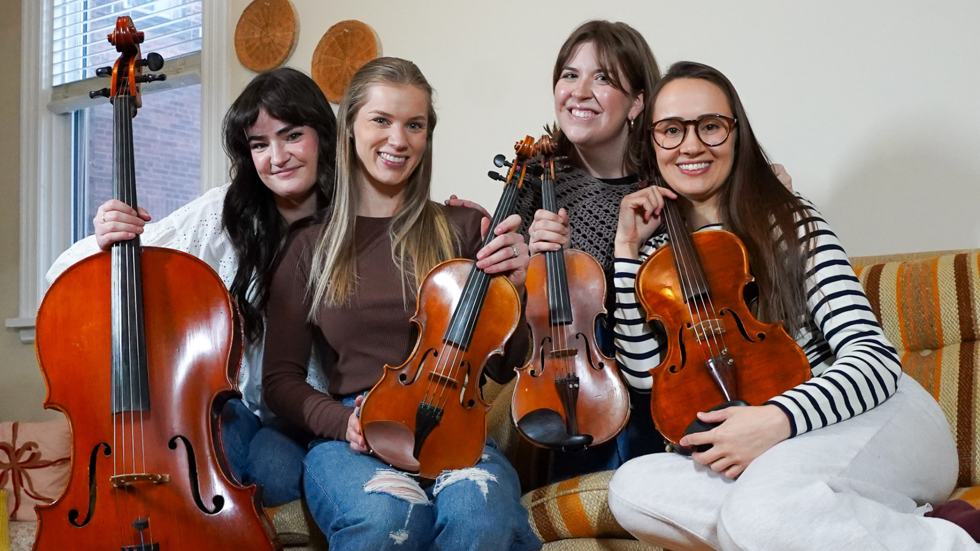 Vintera String Quartet Ontario - Four talented musicians with their instruments playing for weddings and events